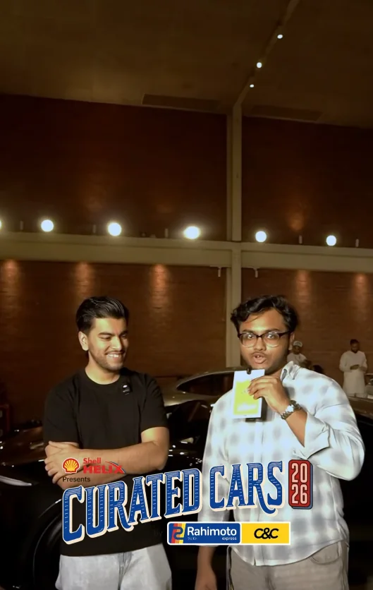 Two hosts at the Curated Cars 2026 showcase with Shell Helix, Rahimoto Express and C&C branding